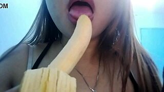 this filipina beauty teases with seductive banana play before getting down to sucking