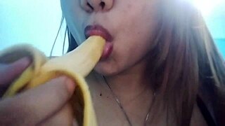 this filipina beauty teases with seductive banana play before getting down to sucking
