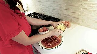 Stepmother gives a blow job to stepson while he is cooking