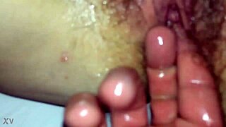 the step mom and her son explore the fat pussy together, fingering and oiling it up in a naughty game