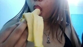 this filipina beauty teases with seductive banana play before getting down to sucking