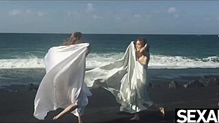 Watch These Two Hot Redheads Go Wild with Lesbian Sex on the Beach