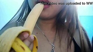 this filipina beauty teases with seductive banana play before getting down to sucking