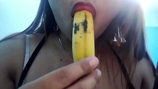 this filipina beauty teases with seductive banana play before getting down to sucking