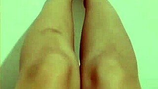 Cute girl spreads legs, fingers her tight shaved pussy to orgasm.