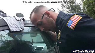 Two police officers take advantage of this black guy at work