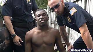 Two police officers take advantage of this black guy at work