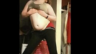 Sexy striptease with ripped clothes and oiled body