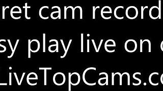 Watch this cam girl secretly playing with her pussy on live top cams?