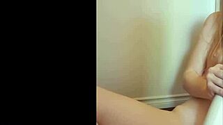 cute redhead teen 18+ undresses and uses wand vibrator