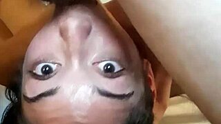 An amateur asian whore gets her throat deeply fucked in a face fucking session.