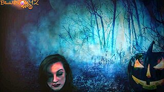 The brunette milf in fishnets gives head to the halloween monster.