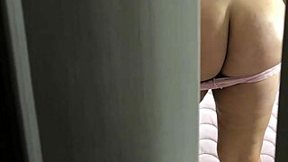 spying on my brunette stepsister through door, tight pussy visible in thong, wow!