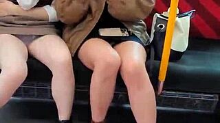 Hey, see these Japanese cuties flashing upskirts on the train!