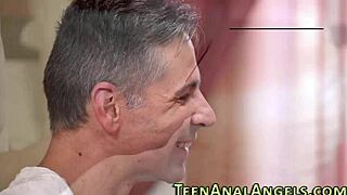 Young European girl gets her ass fucked by a big cock in a group sex scene