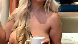 blondie fesser performs live striptease ripping clothes while talking dirty with lesbian partner