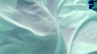 Pool boy in see-through outfit underwater