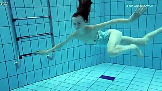 Damn! Striped Swimsuit Teen Anna Netrebko Shows Small Tits in Action!