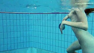 Damn! Striped Swimsuit Teen Anna Netrebko Shows Small Tits in Action!