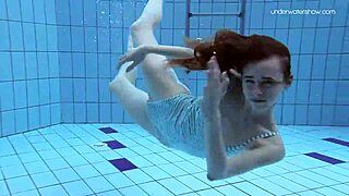 Damn! Striped Swimsuit Teen Anna Netrebko Shows Small Tits in Action!