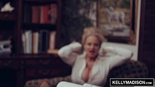 Kelly Madison flaunts big natural tits at work - solo office tease?