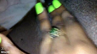 an old ebony woman fingers her tight wet pussy