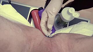 Femdom BDSM scene with a huge toy and an anal examination