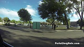 in the porta gloryhole, a redhead's mouth gets pumped full of cum