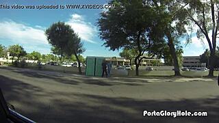 in the porta gloryhole, a redhead's mouth gets pumped full of cum