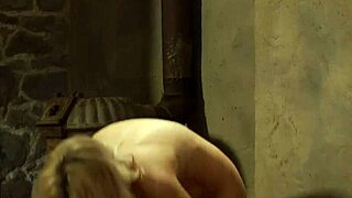 Busty blonde slave receives massage from mistress