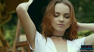 Tiny redhead strips naked for outdoor wood chopping session