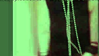 femdom dominates submissive in bondage, breaking chains with heels and music.