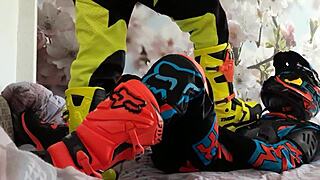 motocross biker in gay costume treads boots