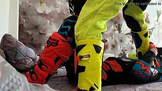 motocross biker in gay costume treads boots