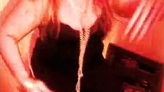 femdom dominates submissive in bondage, breaking chains with heels and music.