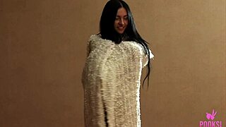 Slim Jim Evelyn teases her perky nipples and fingers her shaved pussy