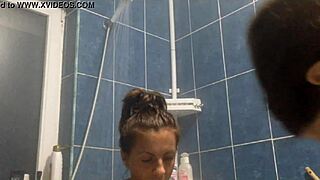 two women share a relaxing shower together