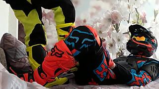 motocross biker in gay costume treads boots