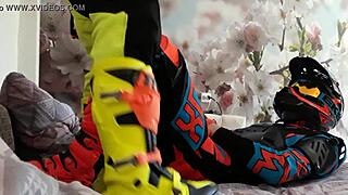 motocross biker in gay costume treads boots