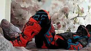 motocross biker in gay costume treads boots