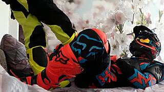 Gay motocross scene with boots and spandex suit