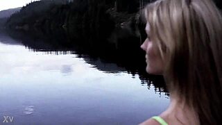 Beautiful blonde swims in the middle of the woods