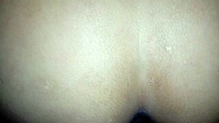 My wife arches, offering her ass and hairy vagina.