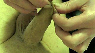 homemade european milf plays with foreskin in latex gloves for fetish handjob 😈