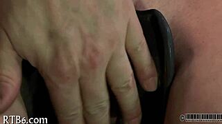 Eager submissive bound in tight bondage restraints for intense play.