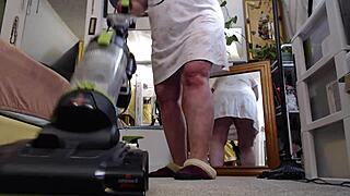 Retro scene of vacuuming in slippers without panties