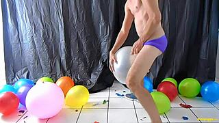 richard lennox plays with balloons and masturbates his big cock