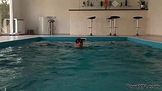 Public pool redhead fisting pussy in bikini