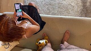 this cute redhead petite wife controls his flaccid dick with precum milking. she's on the phone during it!