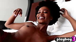 Petite ebony teen Alicia strips red lingerie, revealing perfect small tits in a stunning display